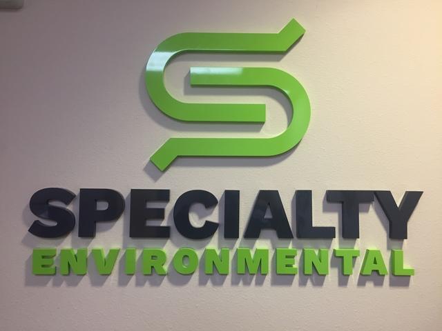 Specialty Environmental logo on headquarters wall.