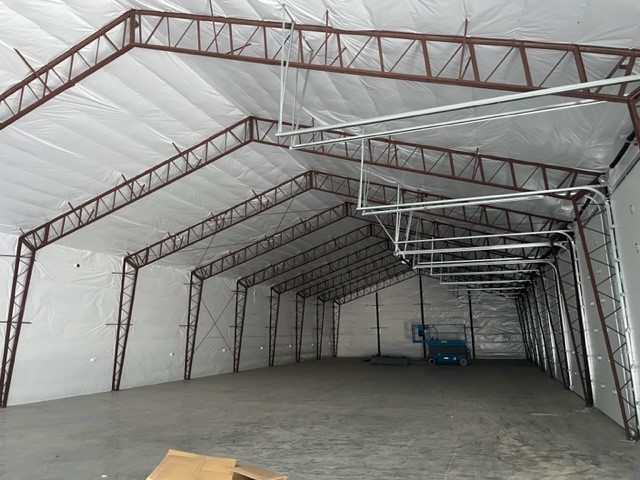 Large Storage Shop in Baker City OR with White WMPVRR Vapor Barrier insulation.