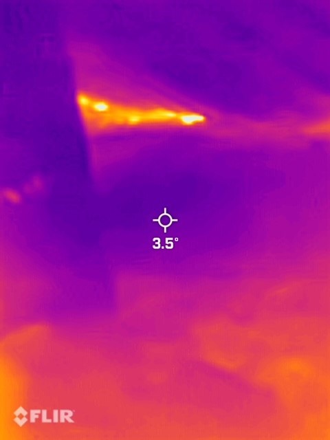 Thermal imagining showing loss of heat through ducts.